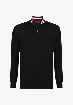 Suéter negro de pullover con cuello con cremallera, textura acanalada y cuello a rayas en rojo y blanco. Mangas largas y puños ajustados.