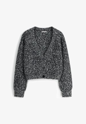 Krótki kardigan w czarno-białym melanżowym wzorze. Posiada głęboki dekolt w kształcie litery V, długie bufiaste rękawy oraz sześć czarnych guzików z przodu.