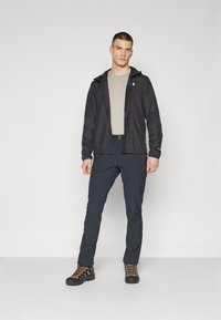 The North Face HIGHER RUN JACKET - Jachetă de vânt - black