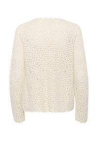 Kremfarbene Häkelstrickjacke mit langen Ärmeln und gewellten Kanten, die mit einem offenen Muster aus Rauten und Rautenprofilen versehen ist.