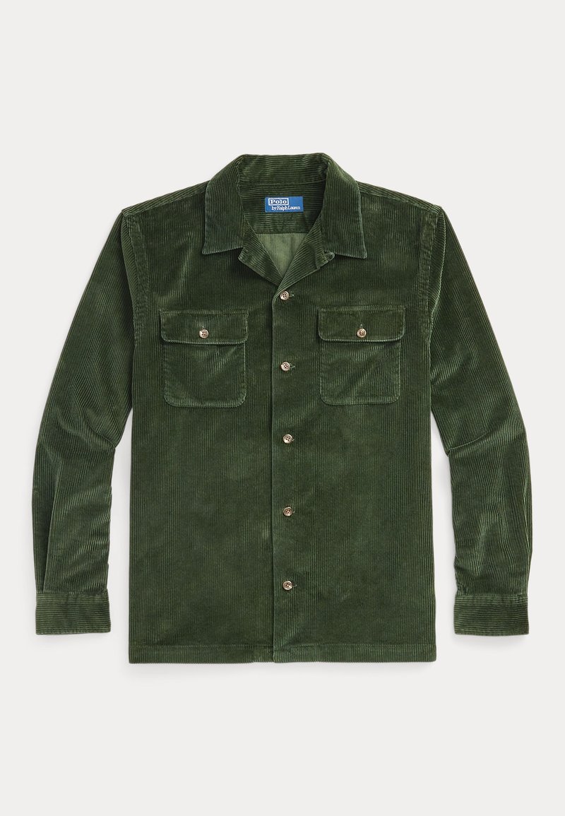 Donkergroene corduroy blouse met lange mouwen, kraag, twee borstzakken en knopen aan de voorkant; opmerkelijke ribbelstructuur door het gehele kledingstuk.