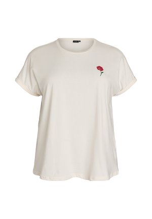 Light beige t-shirt made of soft fabric. Features rolled sleeves and a small red rose embroidery on the left chest area.