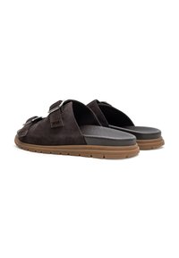 Brown suede slide sandals with two adjustable straps, rubber soles, and a smooth insole. Features silver-tone hardware accents.