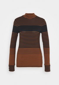 Randig polotröja i svart och rostorange, figurnära design, med långa ärmar som har tumhål och smala ränder som växlar i färg.