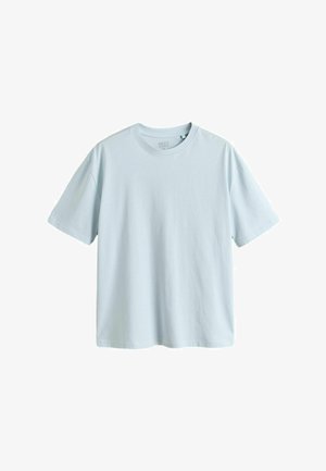 T-shirt bleu clair uni à manches courtes et col rond, taille moyenne, présenté sur un fond blanc.