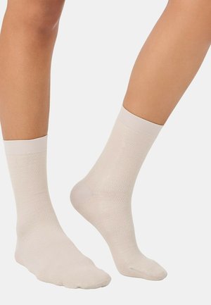 ITEM m6 COMPRESSION CONSCIOUS - Socken - oat milk