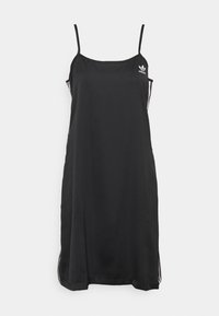 Vestido de satén negro con tirantes finos, aberturas laterales y el icónico logo blanco en el pecho. Textura suave y corte relajado.