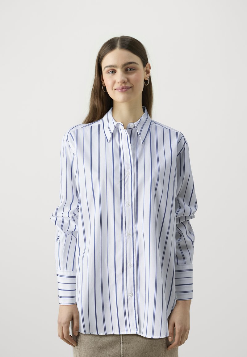 Striped button-up shirt in light blue and white, featuring vertical lines, rounded collar, and long sleeves with buttoned cuffs.