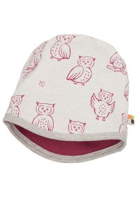 Beanie bianca in cotone con illustrazioni di gufi rosa, dotata di un morbido risvolto grigio foderato e di un'etichetta colorata sul lato.