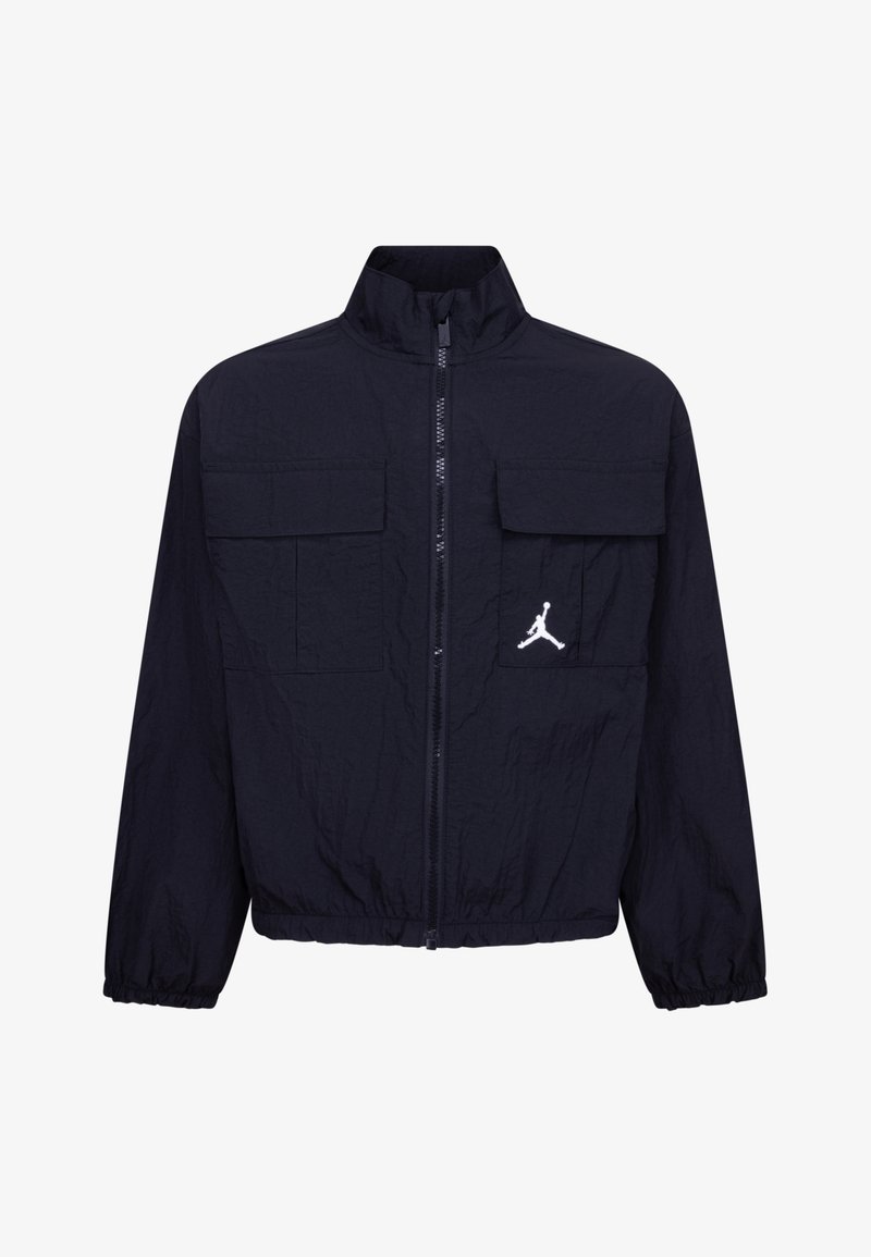 Navy blue zip-up jacket made of lightweight material, featuring two front pockets and a white Jordan logo on the left side.