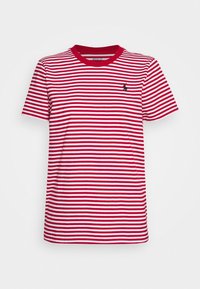 Czerwono-biała koszulka w paski wykonana z bawełny. Krótkie rękawy, okrągły dekolt, posiada małe czarne logo na klatce piersiowej. Miękka faktura.