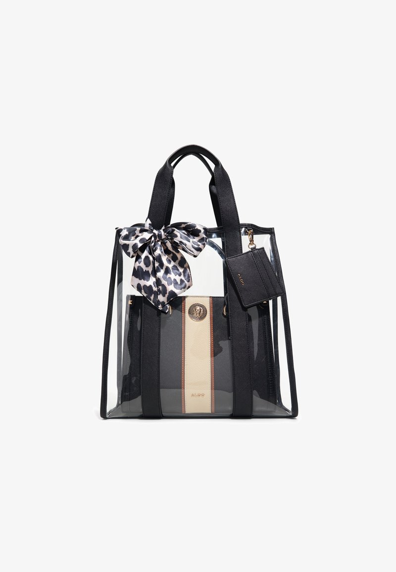 Kirkas reppu mustilla kangaskahvoilla, jossa on leopardikuosiset nauhat ja kiinnitetty pieni musta korttikotelo. Keskiosa vaaleassa ja kultaisessa värissä.