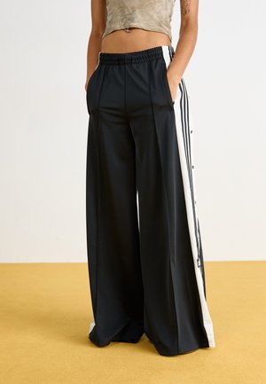 MEGA - Pantaloni sportivi - black