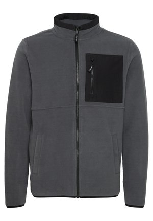 Gray fleece jacket with a high collar, zip-front, and black chest pocket. Features side pockets and contrasting black accents at the hem and cuffs.