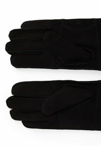Black leather gloves with a smooth texture, featuring elongated fingers and a sleek design. Includes a flap and subtle stitching details.