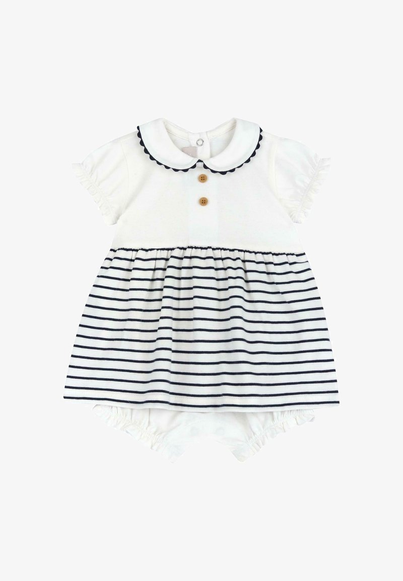 Robe en coton blanc avec rayures bleu marine, col rond et manches courtes à volants. Comprend deux boutons en bois et un bas élastique.