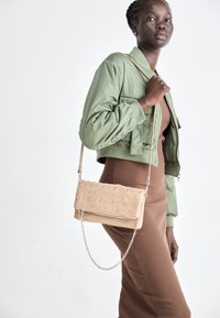 Unselected, beige