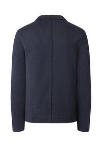 Mörkblå stickad jacka med krage, långa ärmar och en texturerad finish. Har en rak bakseam och ribbade detaljer på kragen.
