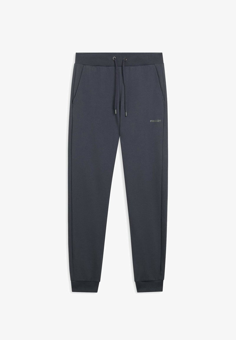 Pantaloni jogger a gamba affusolata grigio scuro con vita elasticizzata, cordino, tasche frontali e piccolo logo sulla coscia sinistra.