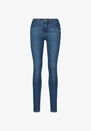 Hubené džíny z tmavě modrého denimu, s klasickým designem pěti kapes, zapínáním na knoflík a jemným vyblednutím na stehnech.