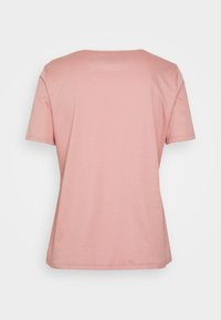 T-skjorte med kort erme i lys rosa stoff, med rund hals og en jevn, litt teksturert overflate. Enkel, klassisk design.