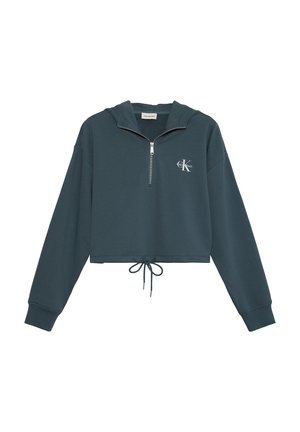 Sweat à capuche court bleu sarcelle foncé avec fermeture éclair devant, cordon de serrage à l'ourlet, manches longues, et petit logo blanc Calvin Klein sur la poitrine.