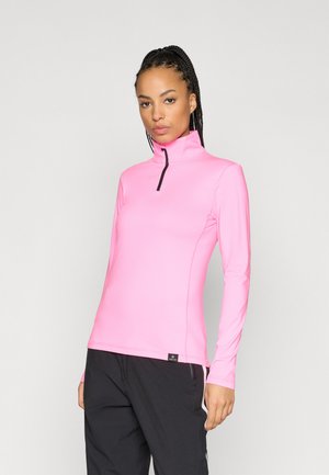 Camisa de manga longa rosa com gola alta, apresentando um zíper preto e costura contrastante, feita de um material liso e elástico.