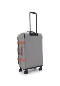 Gray wheeled suitcase with black retractable handle, orange accents, and smooth fabric texture. Features four wheels for easy mobility.