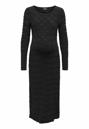 Črna obleka z dolgimi rokavi, ki se ponaša z teksturiranim dizajnom z valovitimi vzorci, dolžine do kolen in okroglim izrezom. Narejena iz mehkega, elastičnega materiala.