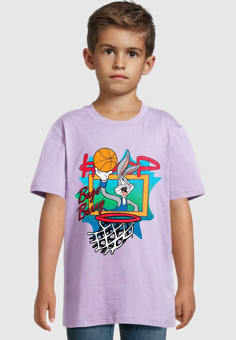 Lilac cotton t-shirt featuring a graphic of Bugs Bunny playing basketball, with vibrant colors, oversized fit, and short sleeves.