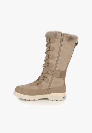 Botte d'hiver beige avec doublure en fourrure, fermeture à lacets à l'avant, fermeture éclair latérale, et semelle blanche robuste adaptée au temps froid.