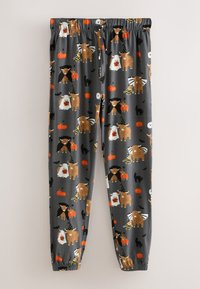 Pantalon de jogging gris avec un motif d'Halloween fantaisiste représentant des ours, des citrouilles et des chauves-souris. Confectionné en tissu doux avec une ceinture élastique.