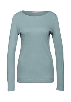 Light blue long-sleeve women's shirt with a round neckline, displayed on a plain white background.