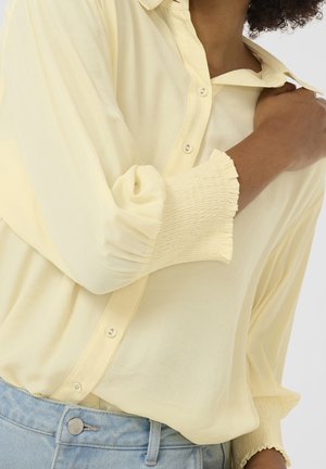 Blusa - light yellow