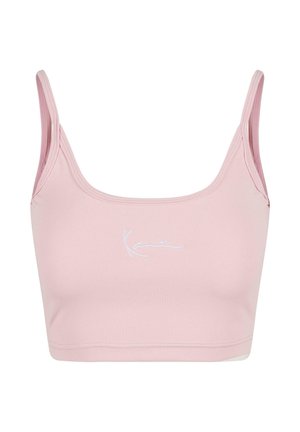 Ružový elastický bralet s širokými ramienkami a okrúhlym výstrihom. Obsahuje jemné biele vyšívané logo na prednej strane. Hladká textúra.