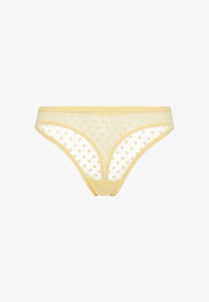Culotte transparente jaune à pois, avec des bords festonnés et une texture douce et légère. Style classique à taille basse.