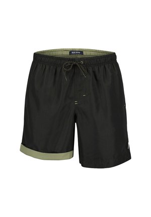 Czarne kąpielówki z zielonym wywiniętym mankietem, elastycznym pasem i sznurkiem do regulacji. Materiał jest gładki, z minimalną ilością szwów.