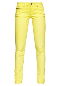 Gula stretchdenimbyxor med slim fit, som har en dragkedjeficka fram, femficksdesign och en mjuk textur.