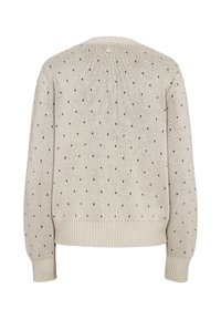 Pull beige en maille avec manches longues et petit motif à pois noirs, poignets et taille côtelés, vue de dos.