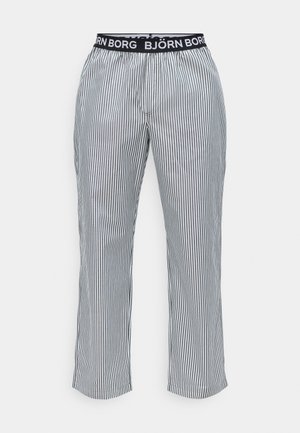 Calças listradas com um cós elástico preto com a etiqueta "BJÖRN BORG." Feitas de um tecido leve, apresentam listras verticais azuis e brancas.