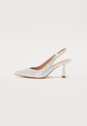 Silver slingback high heel shoe with pointed toe, decorated with small rhinestones, and a slender, shiny heel.