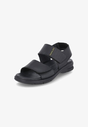 Black sandals feature two wide straps with a textured finish and Velcro closures, designed for comfort with a rubber sole and lightweight design.