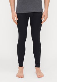 Fekete, feszes leggings rugalmas anyagból; bokáig ér, bordázott mandzsettákkal, sima felülettel és szoros illeszkedéssel.