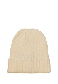 Beanie a coste di colore crema con orlo piegato. La texture è morbida, con linee verticali e una lucentezza sottile.