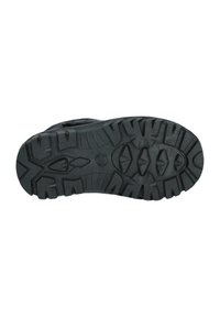 Semelle extérieure en caoutchouc noir avec un motif de tread rugueux, présentant des crampons prononcés pour l'adhérence et un talon lisse et contourné.
