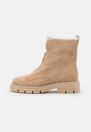 Winter boots - cream