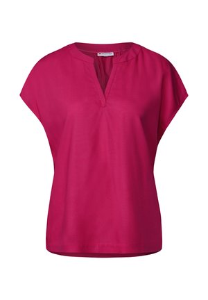 Magenta kortärmad topp med V-ringning och lös passform, tillverkad av ett slätt tyg med en mjuk textur. Enkelt mönster, utan tryck.