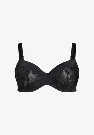 Soutien-gorge noir avec armatures, doté d'une broderie florale et de bretelles réglables. Il présente des bonnets lisses et des accents en dentelle sur les côtés pour une texture supplémentaire.