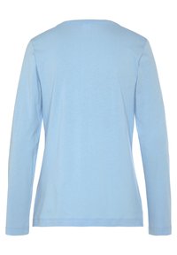 Light blue long-sleeve shirt made from soft cotton, featuring a round neckline and simple design with no patterns or accents.