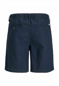 Shorts bleu marine en coton, avec une taille élastique, deux poches arrière avec des fermetures à bouton et un design simple.